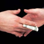 Money exchanging hands image