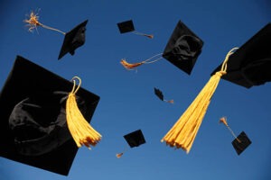 Image of College Hats Flying in America