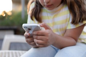 Child on Phone image - Education